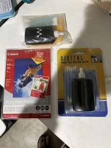 Photo of free digital camera lens cleaning kit and photo papers #1