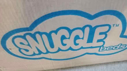 Photo of free Side bars from a Snuggle bed. Brown. Brand new (IP6) #1