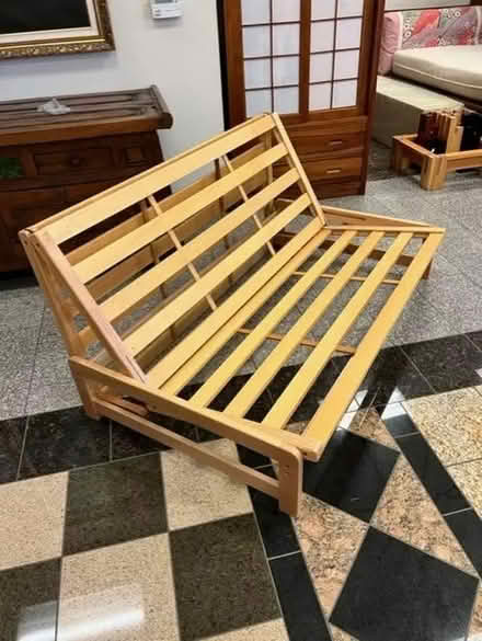 Photo of free Wood queen futon frame, pest damage (Eureka, Henderson Center) #1