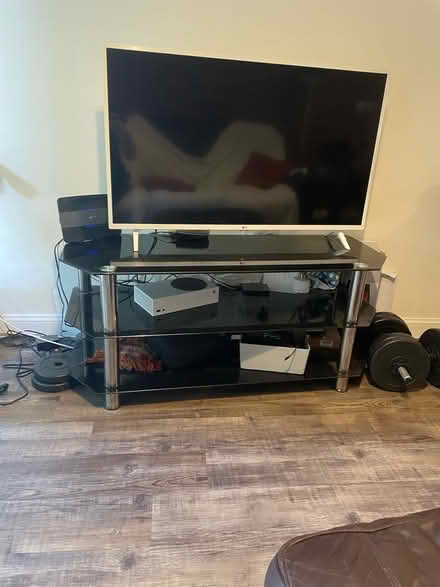 Photo of free Glass TV stand (New Town CO2) #3