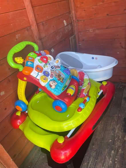 Photo of free T. V Stand, baby walkers and baby bath (Worlingham NR34) #3