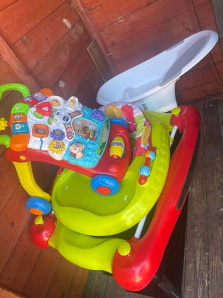 Photo of free T. V Stand, baby walkers and baby bath (Worlingham NR34) #1