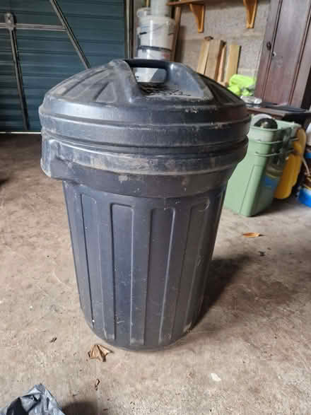 Photo of free Black plastic dustbin with secure lid. (Cob Lane B29) #1