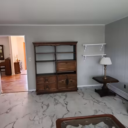 Photo of free Wood bookcase with drop-down desk (Fairfield NJ) #1
