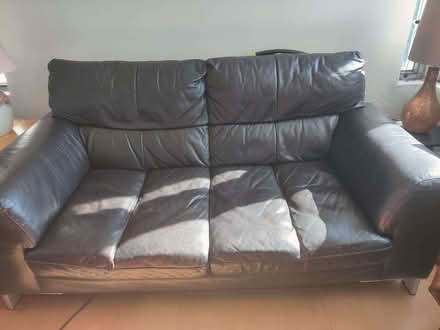 Photo of free 2-Seater Black Leather Sofa – Comfy & Stylish (Hove BN3) #1