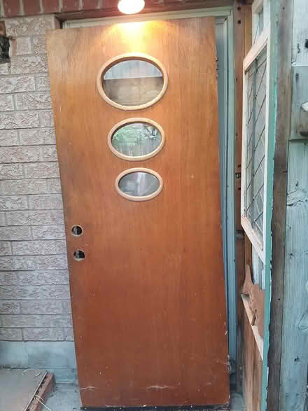 Photo of free Door, hollow, with 3 small windows (downtown Toronto west end) #2