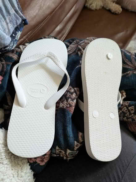 Photo of free New white flip flops/pool side shoes (Freehold LA1) #1
