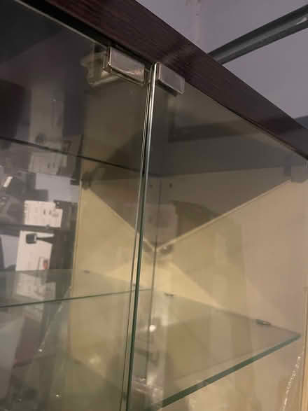 Photo of free Tall Glass cabinet (Romeoville,IL) #3