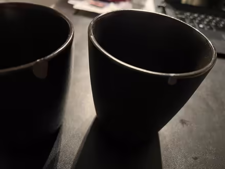 Photo of free Black ceramic mugs, small chip (SE1) #3