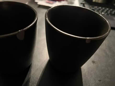 Photo of free Black ceramic mugs, small chip (SE1) #3
