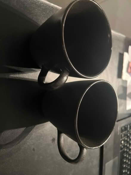 Photo of free Black ceramic mugs, small chip (SE1) #1