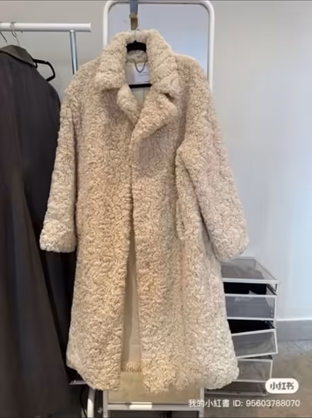 Photo of free White teddy coat size S (W1H 1PG) #1