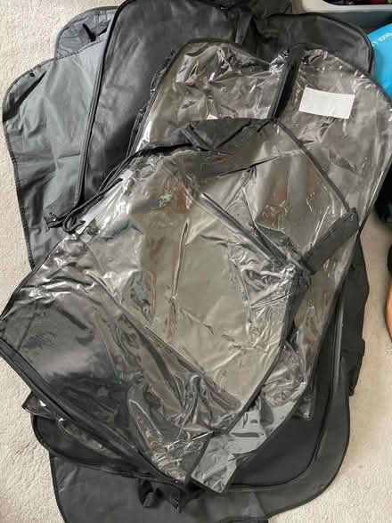 Photo of free 8/9 mixed suit / clothes covers (Broughton PR3) #1