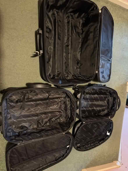 Photo of free 3 black suitcases (OX5 (Kidlington)) #1