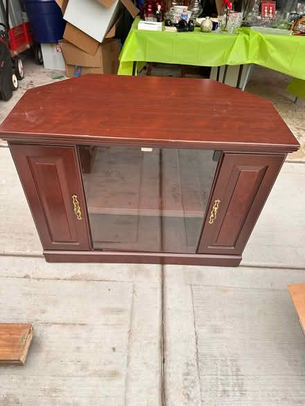 Photo of free Corner TV Stand (Woodridge) #1