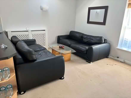 Photo of free Used pair of black leather 3-seater sofas (Sherfield Park RG27) #2