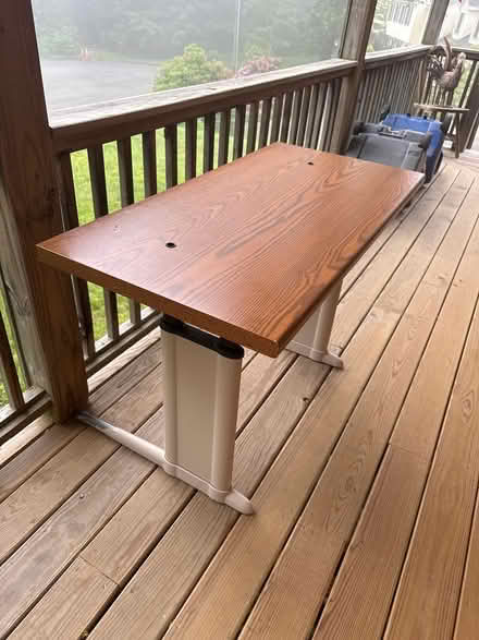 Photo of free Adjustable height desk (06010) #1
