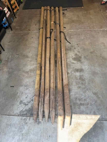 Photo of free 10’ tall tree stakes (Near Del Mar High School) #1