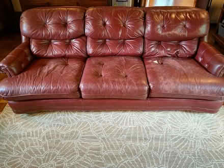 Photo of free Burgundy leather sofa (Hunter Ln & Spring Valley Rd) #1