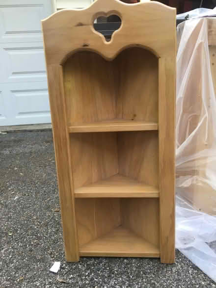 Photo of free Corner bookcase (Carmel NY) #1