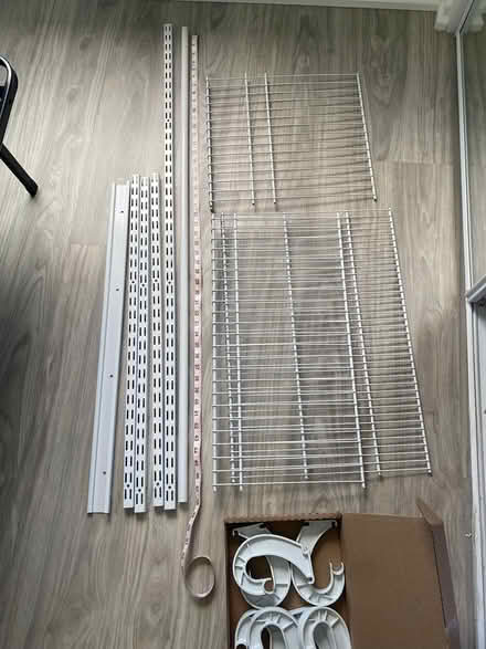 Photo of free Closetmaid parts and curtain rods (Honolulu, HI) #2