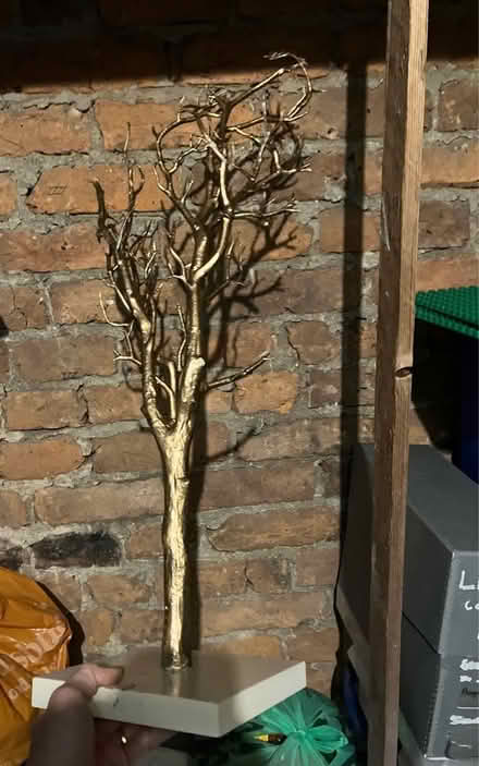 Photo of free 8 x Gold plastic trees with bases (Hastings, TN35) #1