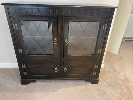 Photo of free Dark wood glass front cabinet (Bovey Tracey TQ13) #1