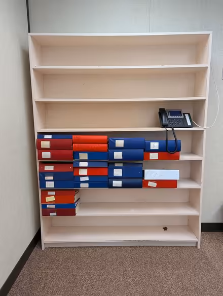 Photo of free tall wood bookshelf (Near Slack and Merivale) #1
