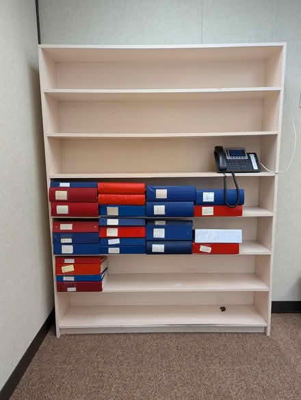 Photo of free tall wood bookshelf (Near Slack and Merivale) #1