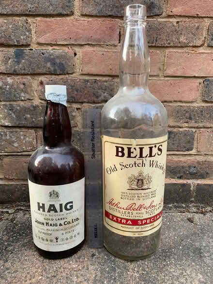 Photo of free Large empty whiskey bottles (Mannings Heath) #1