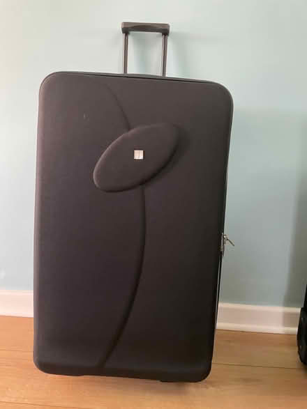 Photo of free 4 black suitcases (Dewsbury WF13) #2