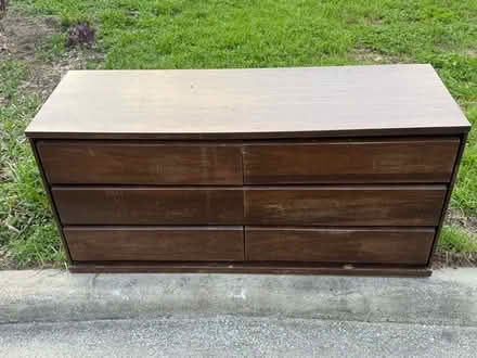 Photo of free Curb alert: low dresser (Midtown West/Levy Park) #1
