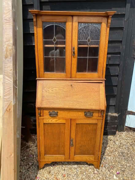 Photo of free Oak desk with glass doored shelves above (Gosmore SG4) #1