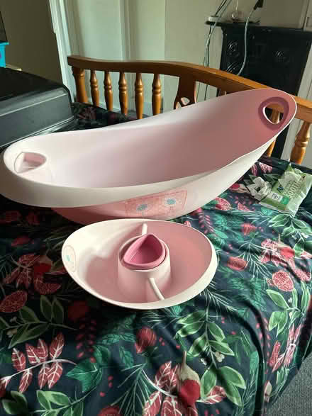 Photo of free Pink baby bath with bottle holder (NR27 9BS) #1
