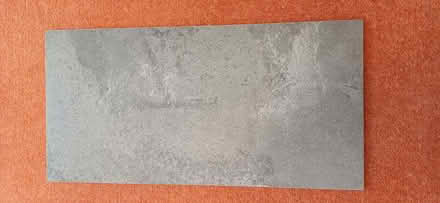 Photo of free Single large tile .. approx 30 x 60cm - Mid Grey (IP4) #1