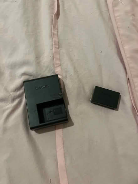 Photo of free Camera battery and charger (Brighton 15th St.) #1