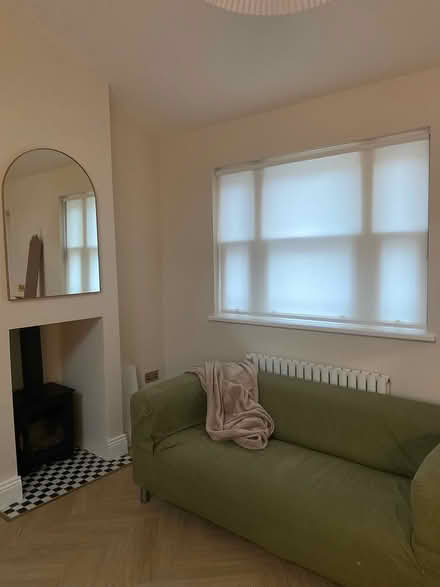 Photo of free Green two seater sofa (Stoneybatter Dublin 7) #1