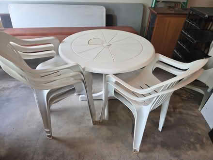 Photo of free Plastic white table and 5 chairs (Bull Mountain, Tigard) #1