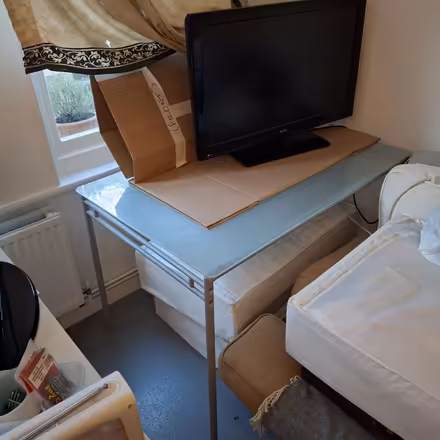 Photo of free Glass Topped Dining Table (Kentish Town West, NW5) #1