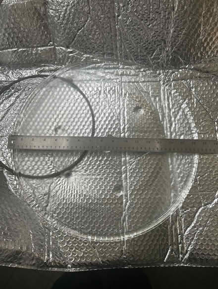 Photo of free Microwave dish 16-1/2 inches wide (10011 (17th & 9th)) #1
