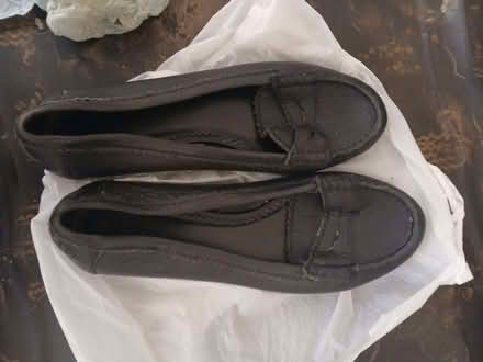 Photo of free Women's black leather flats size 7 (Earlsfield SW18) #1