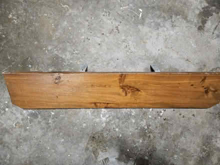 Photo of free Wooden shelf w/ brackets (63124, near STL Galleria) #1