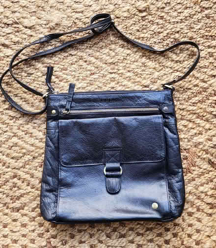 Photo of free Black leather purse (Maple Leaf) #1