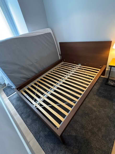 Photo of free King size IKEA wood bed frame with headboard excellent shape (High St Ken W8) #1