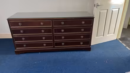 Photo of free Mahogany 8 drawers glass top wide chest. Great condition. (Olympia W14) #1