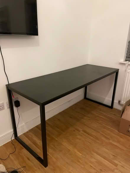 Photo of free Modern black desk with cable holder (Loughborough LE11) #2