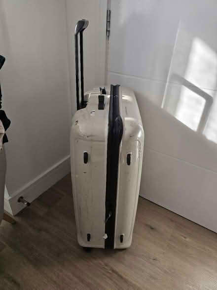 Photo of free Large suitcase (GU7 1AX) #2