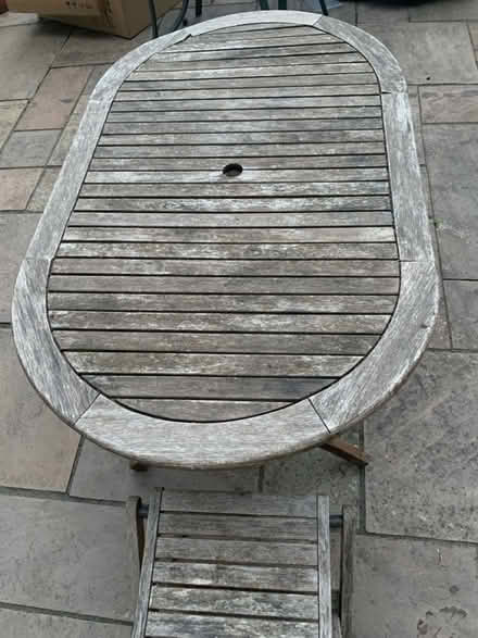 Photo of free Wooden outdoor table and chair (highcliffe BH23) #1