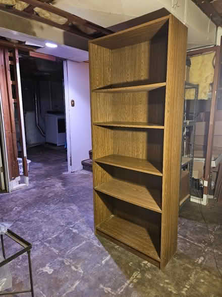 Photo of free 6' tall bookshelf, pressed wood (63124, near STL Galleria) #1
