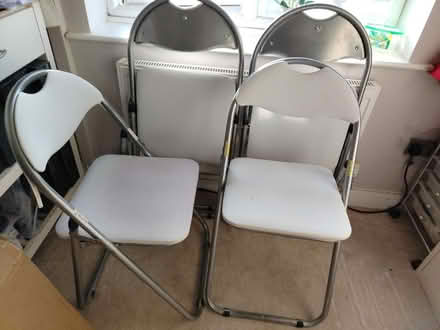 Photo of free 4 folding metal chairs (GL51 4UR) #3